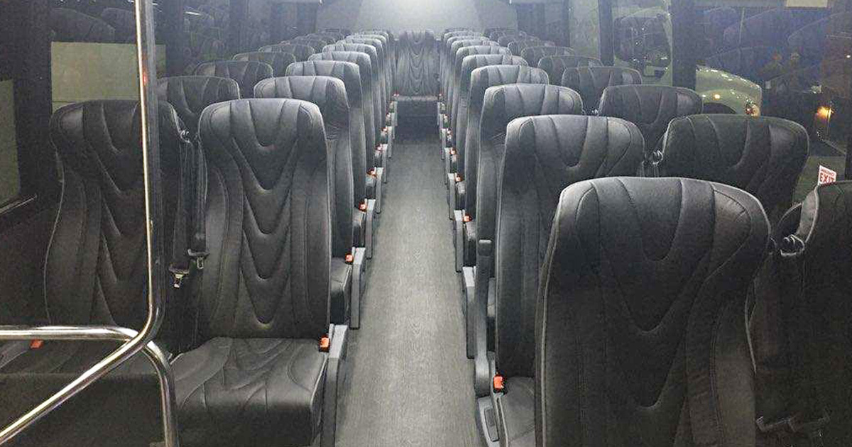 Monumental Tours Vehicle Fleet 39 passenger inside