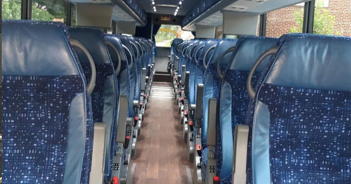 55 passenger inside van3 Monumental Tours 55 passenger van